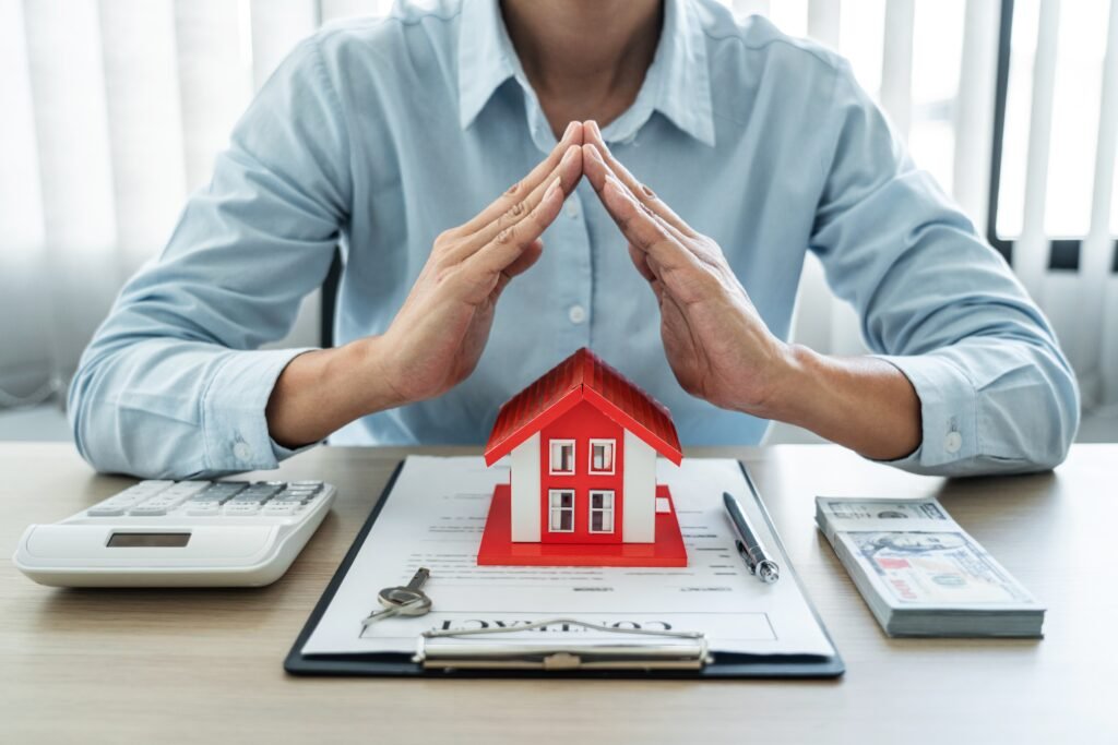 Ignite Your Real Estate Ventures: Unveiling the Secrets of How to Find Fire Damaged Properties 3 female real estate agent is use hands to protect r 2022 11 15 15 40 36 utc
